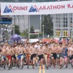 The junior race starts Thursday, July 4, 2024, at the Mount Marathon Race in Seward, Alaska. (Photo by Jeff Helminiak/Peninsula Clarion)