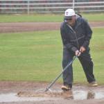 Post 20 Twins coach Robb Quelland works the field between innings Saturday, July 6, 2024, at Coral Seymour Memorial Park in Kenai, Alaska. (Photo by Jeff Helminiak/Peninsula Clarion)
