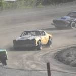 Keven Powers rounds Turn 4 ahead of Regan Savely in A Stock Heat 2 on Sunday, July 7, 2024, at the Skylar Thomas Memorial at Twin City Raceway in Kenai, Alaska. (Photo by Jeff Helminiak/Peninsula Clarion)
