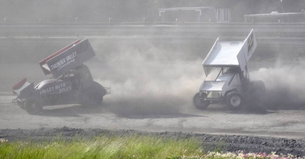 Philip Hutchings leads as Jordan Rodrigue begins to spin out in Sprint Heat 1 on Sunday, July 7, 2024, in the Skylar Thomas Lyon Memorial at Twin City Raceway in Kenai, Alaska. Rodrigue was third, while Hutchings was fourth. (Photo by Jeff Helminiak/Peninsula Clarion)