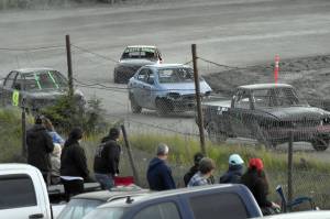 Fans watch Mini Stock Heat 2 on Sunday, July 7, 2024, in the Skylar Thomas Lyon Memorial at Twin City Raceway in Kenai, Alaska. (Photo by Jeff Helminiak/Peninsula Clarion)