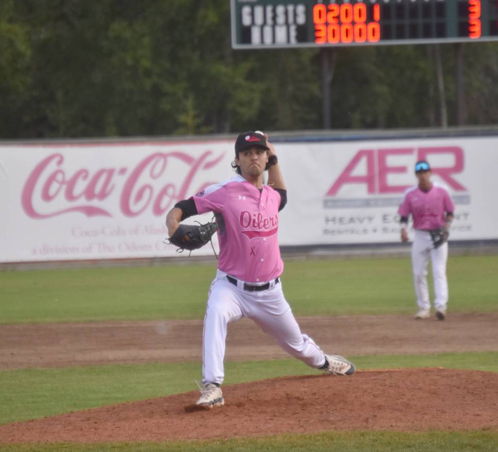 Peninsula Oilers reliever Cameron Teper delivers to the Chugiak-Eagle River Chinooks on Thursday, July 11, 2024, at Coral Seymour Memorial Park in Kenai, Alaska. (Photo by Jeff Helminiak/Peninsula Clarion)