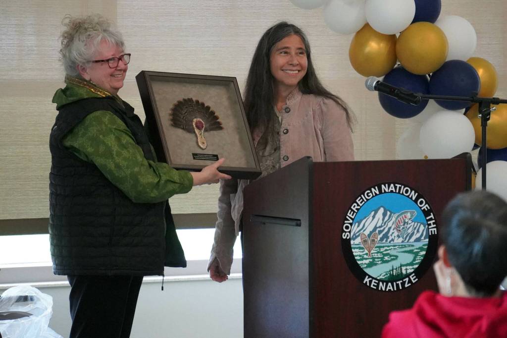 Kenaitze Indian Tribe Tribal Council Chair Bernadine Atchison receives a gift to the tribe from Southcentral Foundation Senior Medial Director of Quality Assurance Dr. Donna Galbreath during a celebration of the 10th anniversary of the Denaina Wellness Center in Kenai, Alaska, on Friday, July 12, 2024. (Jake Dye/Peninsula Clarion)