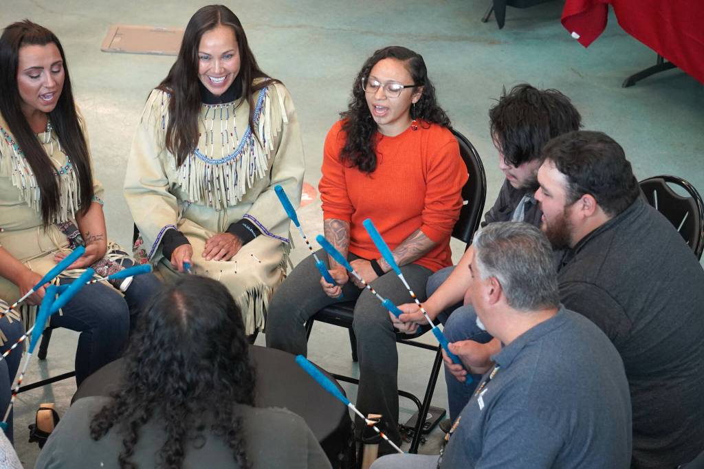Drummers perform during a celebration of the 10th anniversary of the Denaina Wellness Center in Kenai, Alaska, on Friday, July 12, 2024. (Jake Dye/Peninsula Clarion)