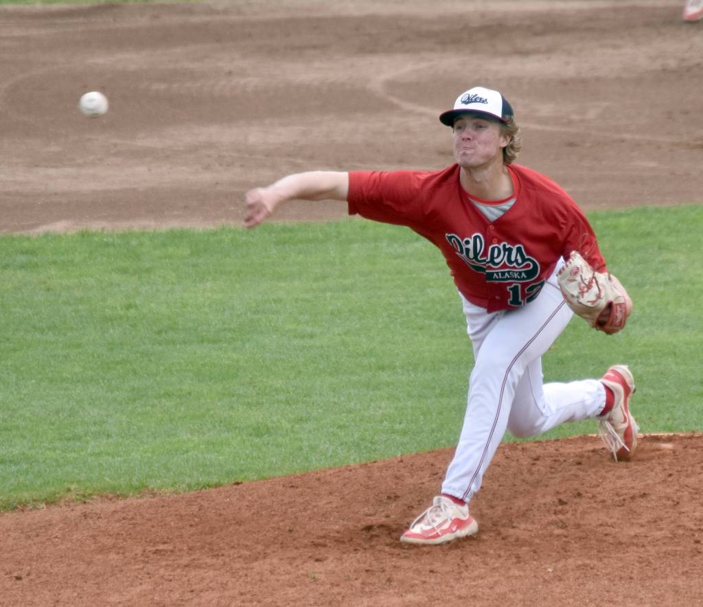 Peninsula Oilers starter Aaron Morris delivers to the Chugiak-Eagle River Chinooks during the second game of a doubleheader Sunday, July 14, 2024, at Coral Seymour Memorial Park in Kenai, Alaska. (Photo by Jeff Helminiak/Peninsula Clarion)