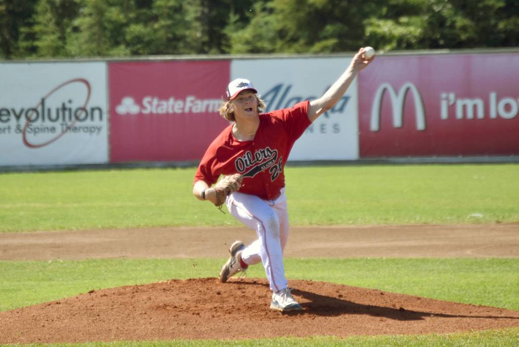 Peninsula Oilers starter Cody New delivers to the Chugiak-Eagle River Chinooks during the first game of a doubleheader Sunday, July 14, 2024, at Coral Seymour Memorial Park in Kenai, Alaska. (Photo by Jeff Helminiak/Peninsula Clarion)