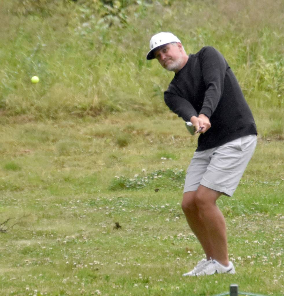 Nolan Rose chips onto the No. 3 green at the State Farm Agent Heith Groth Pro Am and Skins Game on Monday, July 15, 2024, at Birch Ridge Golf Course in Soldotna, Alaska. (Photo by Jeff Helminiak/Peninsula Clarion)