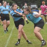 Beth Pokorny of Scylla Rugby tries to slow down Jay Port of the Kenai River SheWolves at the Kenai Dipnet Fest Rugby 10s Tournament on Saturday, July 13, 2024, in Kenai, Alaska. (Photo by Jeff Helminiak/Peninsula Clarion)