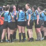 The Kenai River SheWolves get together after a match at the Kenai Dipnet Fest Rugby 10s Tournament on Saturday, July 13, 2024, in Kenai, Alaska. (Photo by Jeff Helminiak/Peninsula Clarion)
