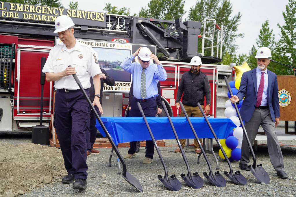 Central Emergency Services Chief Roy Browning and other dignitaries ready their shovels at a groundbreaking for the new Central Emergency Services Station 1 in Soldotna, Alaska, on Wednesday, July 24, 2024. (Jake Dye/Peninsula Clarion)