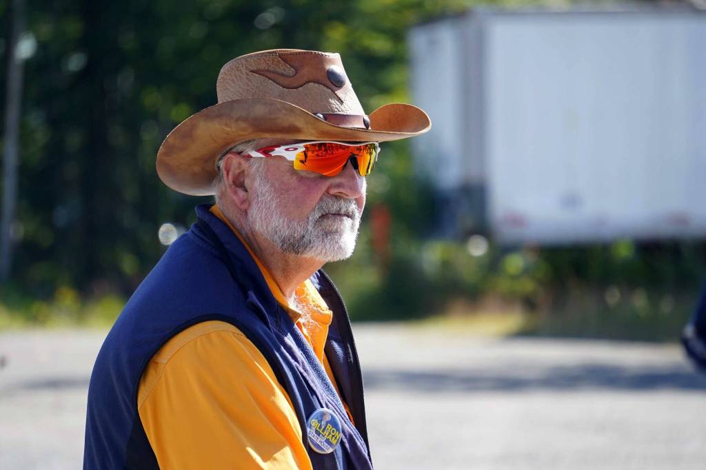 Ron Gillham, candidate for the Alaska House of Representatives, walks with the 67th Annual Soldotna Progress Days Parade down Binkley Street in Soldotna, Alaska, on Saturday, July 27, 2024. (Jake Dye/Peninsula Clarion)