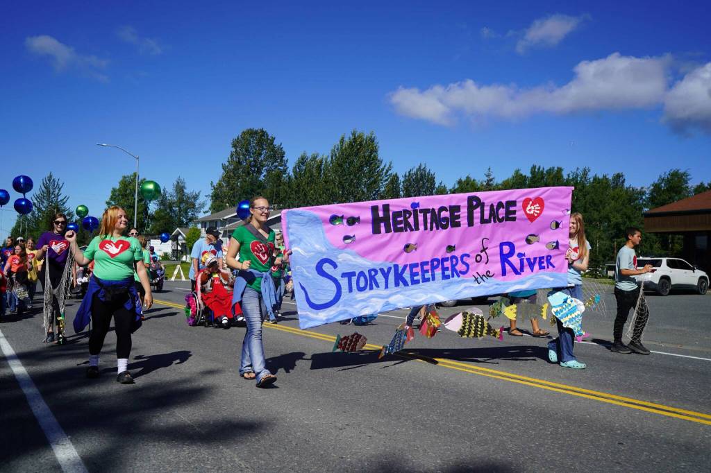 Heritage Place staff and residents walk with the 67th Annual Soldotna Progress Days Parade on Marydale Avenue in Soldotna, Alaska, on Saturday, July 27, 2024. (Jake Dye/Peninsula Clarion)