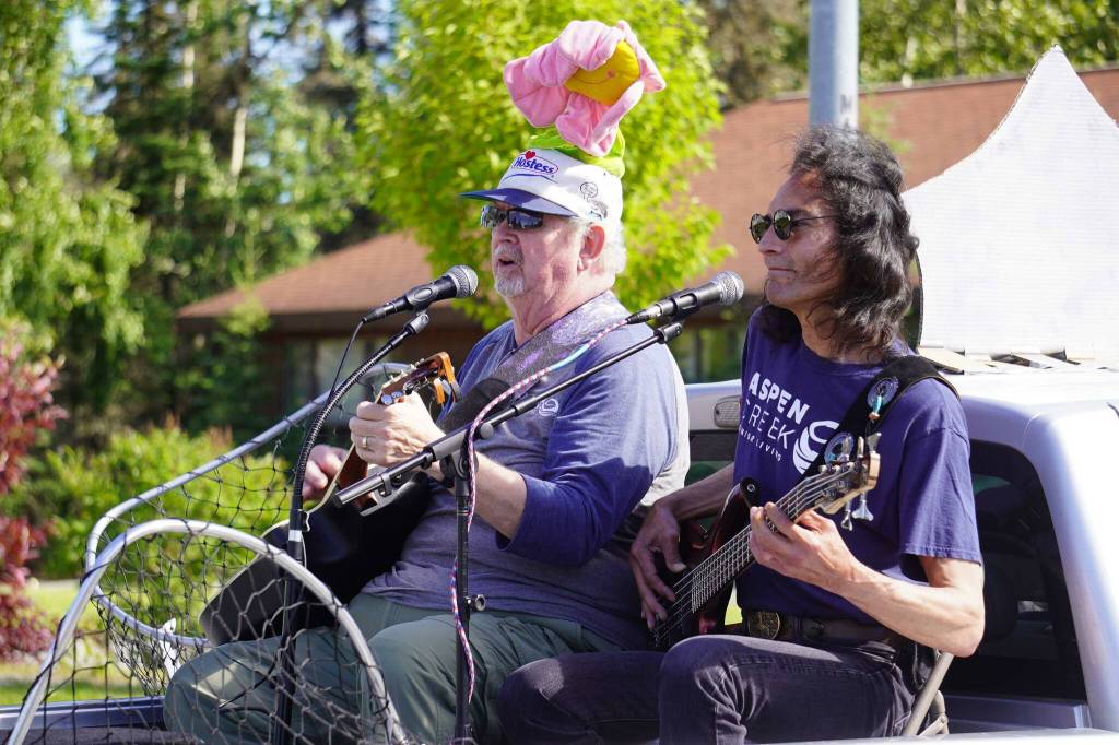 Performers for Aspen Creek Senior Living roll with the 67th Annual Soldotna Progress Days Parade on Marydale Avenue in Soldotna, Alaska, on Saturday, July 27, 2024. (Jake Dye/Peninsula Clarion)