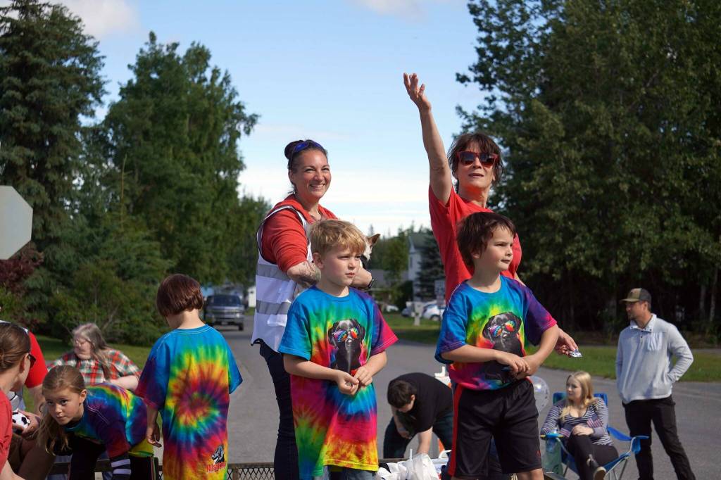 Sara Erickson, of AlaSkins, tosses candy while rolling with the 67th Annual Soldotna Progress Days Parade on Marydale Avenue in Soldotna, Alaska, on Saturday, July 27, 2024. (Jake Dye/Peninsula Clarion)