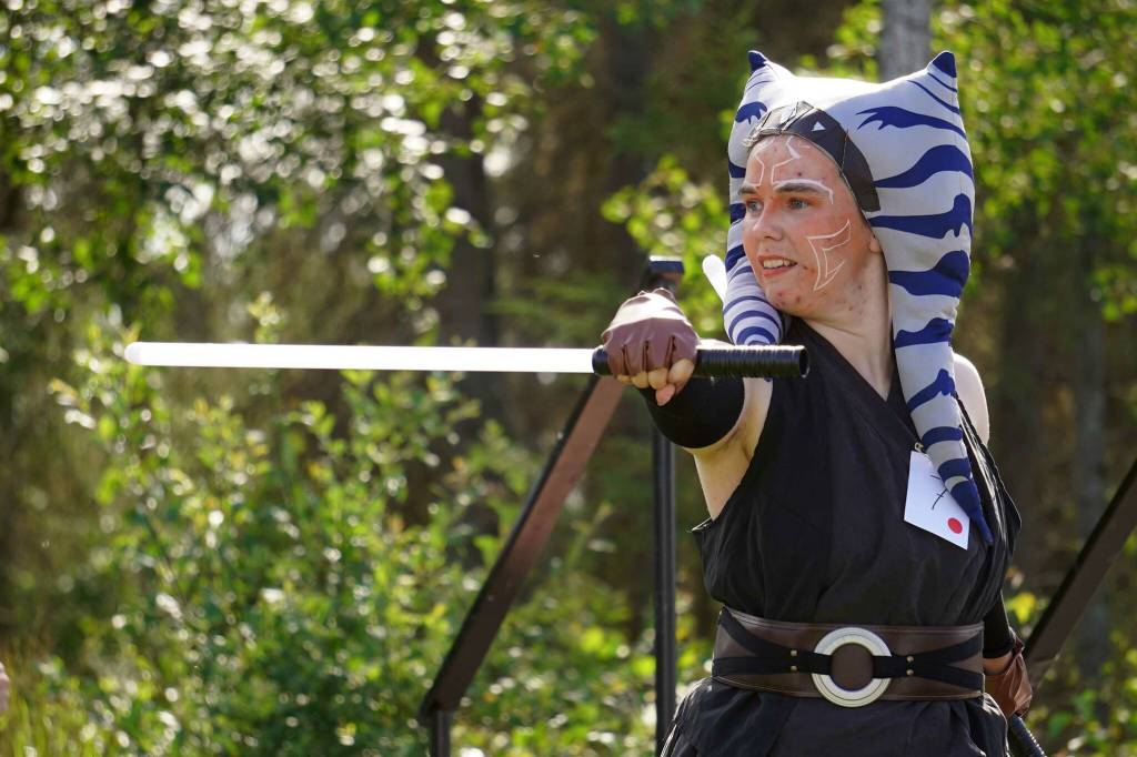 Sean Prisk shows off cosplay of Star Wars character Ahsoka Tano during the Kenai Performers Cosplay Costume Contest at the Soldotna Progress Days Block Party in Parker Park in Soldotna, Alaska, on Saturday, July 27, 2024. (Jake Dye/Peninsula Clarion)