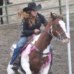 Jade Campbell competes in Pole Bending at the third Soldotna Equestrian Association rodeo of the season Sunday, July 28, 2024, at the Soldotna Rodeo Grounds in Soldotna, Alaska. (Photo by Jeff Helminiak/Peninsula Clarion)