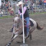 Hally Hanson competes in Pole Bending at the third Soldotna Equestrian Association rodeo of the season Sunday, July 28, 2024, at the Soldotna Rodeo Grounds in Soldotna, Alaska. (Photo by Jeff Helminiak/Peninsula Clarion)