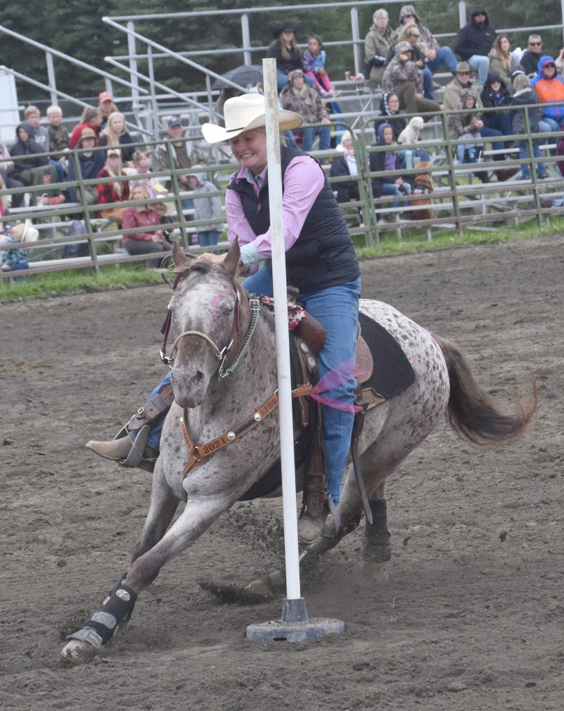 Hally Hanson competes in Pole Bending at the third Soldotna Equestrian Association rodeo of the season Sunday, July 28, 2024, at the Soldotna Rodeo Grounds in Soldotna, Alaska. (Photo by Jeff Helminiak/Peninsula Clarion)