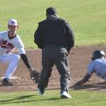 Peninsula Oilers second baseman Eddie Leon gets ready to tag out Troy Sanders of the Anchorage Glacier Pilots on Monday, July 29, 2024, at Coral Seymour Memorial Park in Kenai, Alaska. (Photo by Jeff Helminiak/Peninsula Clarion)