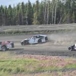 Clay Petersen leads Jesse Yancy and Dustin Bass in Heat 1 of Modifieds on Saturday, July 27, 2024, at Twin City Raceway in Kenai, Alaska. Bass would win the race, while Yancy was second and Petersen was third. (Photo by Jeff Helminiak/Peninsula Clarion)