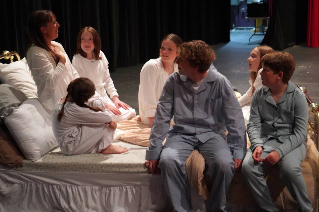 The Triumvirate Theatres cast of The Sound of Music rehearse at Soldotna High School in Soldotna, Alaska, on Friday, Aug. 2, 2024. (Jake Dye/Peninsula Clarion)