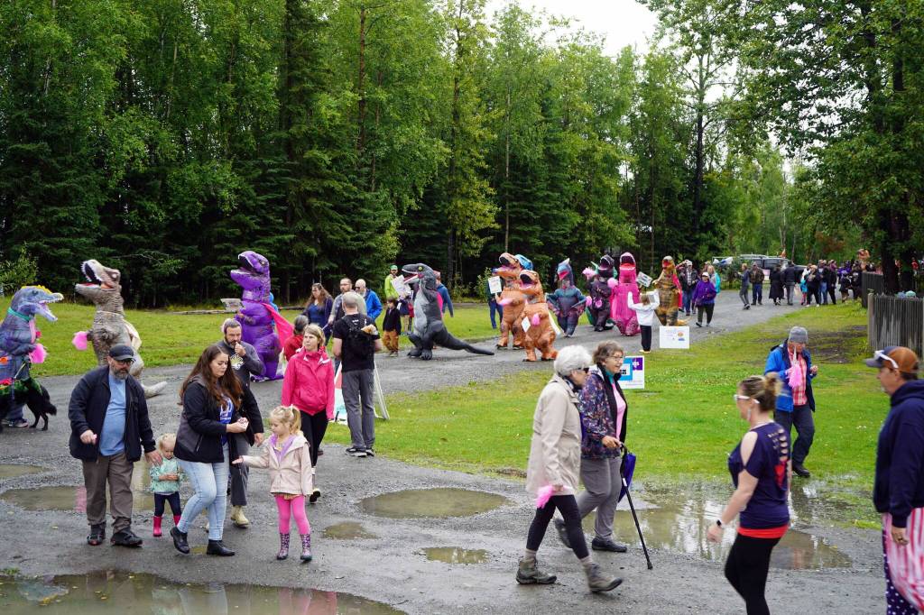 Racers near the Kenai Lions Refueling Station during the Brewery to Bathroom .5K The Race for the Rest of Us at Kenai River Brewing in Soldotna, Alaska, on Saturday, Aug. 11, 2024. (Jake Dye/Peninsula Clarion)