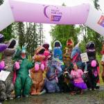The Dino Divas are named .5K-est at the Brewery to Bathroom .5K The Race for the Rest of Us at Kenai River Brewing in Soldotna, Alaska, on Saturday, Aug. 11, 2024. (Jake Dye/Peninsula Clarion)