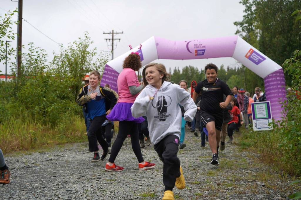 Racers set out on the Brewery to Bathroom .5K The Race for the Rest of Us at Kenai River Brewing in Soldotna, Alaska, on Saturday, Aug. 11, 2024. (Jake Dye/Peninsula Clarion)
