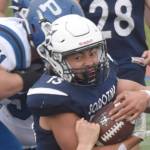 Soldotna's Lokeni Wong fights for yards against Luke Sena (51) and Jason Reese of Palmer on Friday, Aug. 16, 2024, at Justin Maile Field at Soldotna High School in Soldotna, Alaska. (Photo by Jeff Helminiak/Peninsula Clarion)