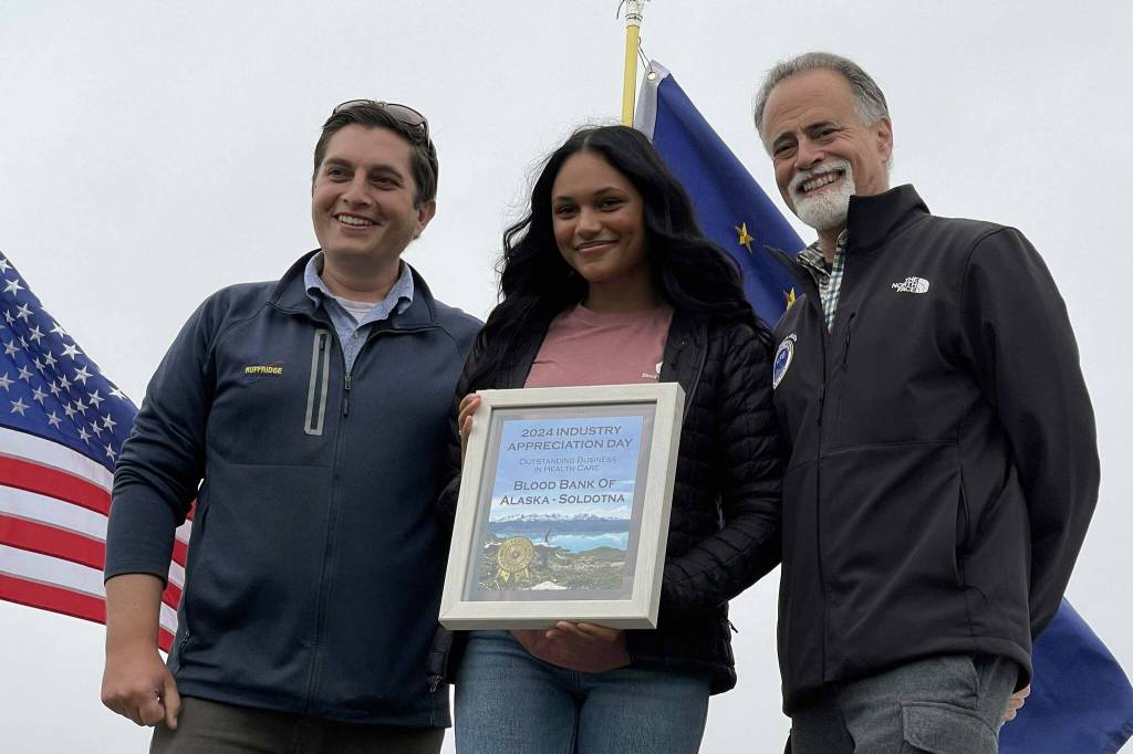 The Blood Bank of Alaska receives the Outstanding Business in Health Care award at Industry Appreciation Day in Kenai, Alaska, on Saturday, Aug. 17, 2024. (Jake Dye/Peninsula Clarion)