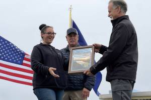 Samantha Springer receives the Outstanding Individual in Tourism award at Industry Appreciation Day in Kenai, Alaska, on Saturday, Aug. 17, 2024. (Jake Dye/Peninsula Clarion)