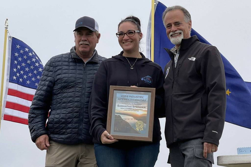 Samantha Springer receives the Outstanding Individual in Tourism award at Industry Appreciation Day in Kenai, Alaska, on Saturday, Aug. 17, 2024. (Jake Dye/Peninsula Clarion)
