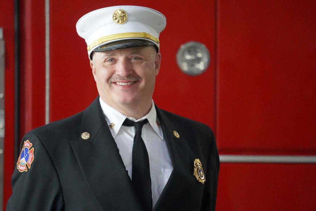 Kenai Fire Department Deputy Chief John Harris speaks at a dedication ceremony for a pair of new ambulances at the Kenai Public Safety Building in Kenai, Alaska, on Saturday, Aug. 17, 2024. (Jake Dye/Peninsula Clarion)