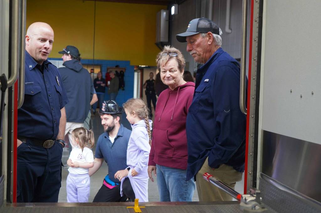 Kenai Fire Department staff give tours of a pair of new ambulances at the Kenai Public Safety Building in Kenai, Alaska, on Saturday, Aug. 17, 2024. (Jake Dye/Peninsula Clarion)