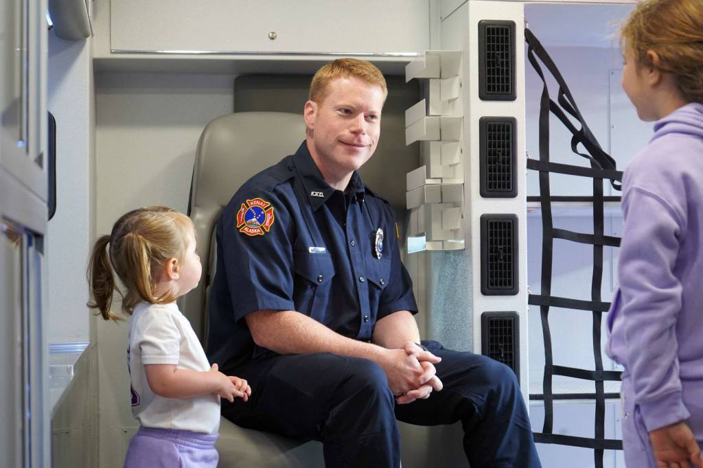 Kenai Fire Department staff give tours of a pair of new ambulances at the Kenai Public Safety Building in Kenai, Alaska, on Saturday, Aug. 17, 2024. (Jake Dye/Peninsula Clarion)