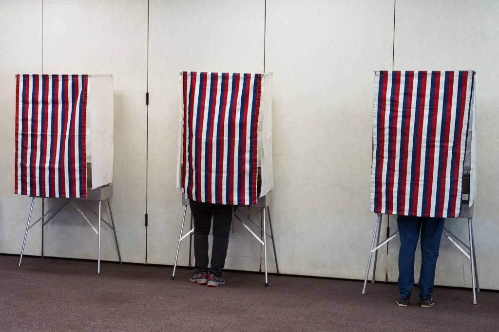 Voters fill out their ballots at the Soldotna Regional Sports Complex in Soldotna, Alaska, during the Alaska Primary Election Day on Tuesday, Aug. 20, 2024. (Jake Dye/Peninsula Clarion)