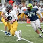 Homers Preston Stanislaw carries the ball against Redington on Friday, Aug. 23, 2024, in Wasilla, Alaska. (Photo courtesy of Bruce Eggleston/matsusports.net)