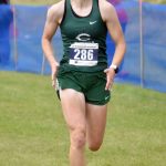 Colonys Ella Hopkins runs to victory in the girls varsity race at the Ted McKenney XC Invitational on Saturday, Aug. 24, 2024, at Tsalteshi Trails just outside of Soldotna, Alaska. (Photo by Jeff Helminiak/Peninsula Clarion)