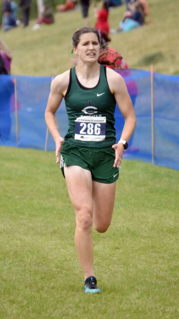 Colonys Ella Hopkins runs to victory in the girls varsity race at the Ted McKenney XC Invitational on Saturday, Aug. 24, 2024, at Tsalteshi Trails just outside of Soldotna, Alaska. (Photo by Jeff Helminiak/Peninsula Clarion)