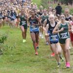 Service's Talia Smith leads the girls varsity race up Angle Hill during the Ted McKenney XC Invitational on Saturday, Aug. 24, 2024, at Tsalteshi Trails just outside of Soldotna, Alaska. (Photo by Jeff Helminiak/Peninsula Clarion)