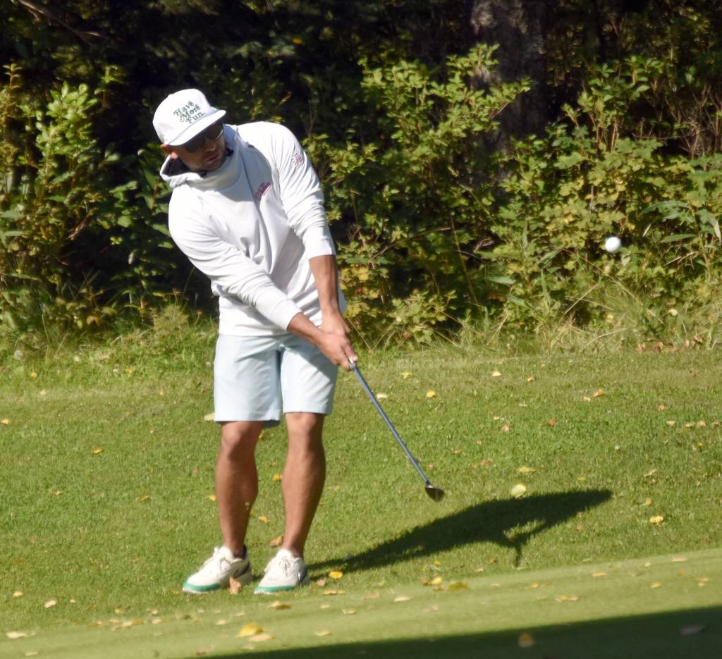 Jared Ramm chips to the No. 15 green at the Birch Ridge Amateur Championship on Sunday, Aug. 25, 2024, at Birch Ridge Golf Course in Soldotna, Alaska. (Photo by Jeff Helminiak/Peninsula Clarion)