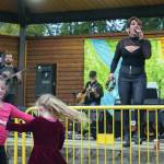 Children dance as Ellie and the Echoes perform the last night of the Levitt AMP Soldotna Music Series at Soldotna Creek Park on Wednesday. (Jake Dye/Peninsula Clarion)