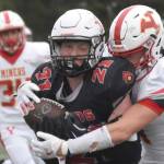 Kenai Central's Hollan Chadwick catches a pass in front of Ryan Warfield of Yreka (California) on Friday, Aug. 30, 2024, at Ed Hollier Field at Kenai Central HIgh School in Kenai, Alaska. (Photo by Jeff Helminiak/Peninsula Clarion)