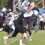 Nikiskis Trigger McCaughey tackles Valdezs Dylan Passage on Saturday, Aug. 31, 2024, at Nikiski Middle-High School in Nikiski, Alaska. (Photo by Jeff Helminiak/Peninsula Clarion)
