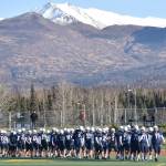 Soldotna head coach Galen Brantley Jr. leads his team back on the field after halftime Saturday, Oct. 21, 2023, in the Division II championship game at Service High School in Anchorage, Alaska. (Photo by Jeff Helminiak/Peninsula Clarion)