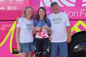 From left: Sara, Kristen and Jon Faulkner pose with Kristen's two gold medals at the 2024 Olympics in Paris, France. (Photo provided by Jon Faulkner)