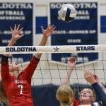 Kenai Centrals Sophie Tapley and Ellsi Miller put up a block Thursday, Sept. 5, 2024, at Soldotna High School in Soldotna, Alaska. (Photo by Jeff Helminiak/Peninsula Clarion)