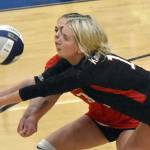 Kenai Central's Brynnen Hansen steps in front of Tait Cooper for a dig Thursday, Sept. 5, 2024, at Soldotna High School in Soldotna, Alaska. (Photo by Jeff Helminiak/Peninsula Clarion)