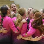 Kenai Central celebrates winning the title Saturday, Sept. 7, 2024, at the 17th Annual Shayna Pritchard Memorial Volleyball Tournament at Nikiski Middle-High School in Nikiski, Alaska. (Photo by Jeff Helminiak/Peninsula Clarion)