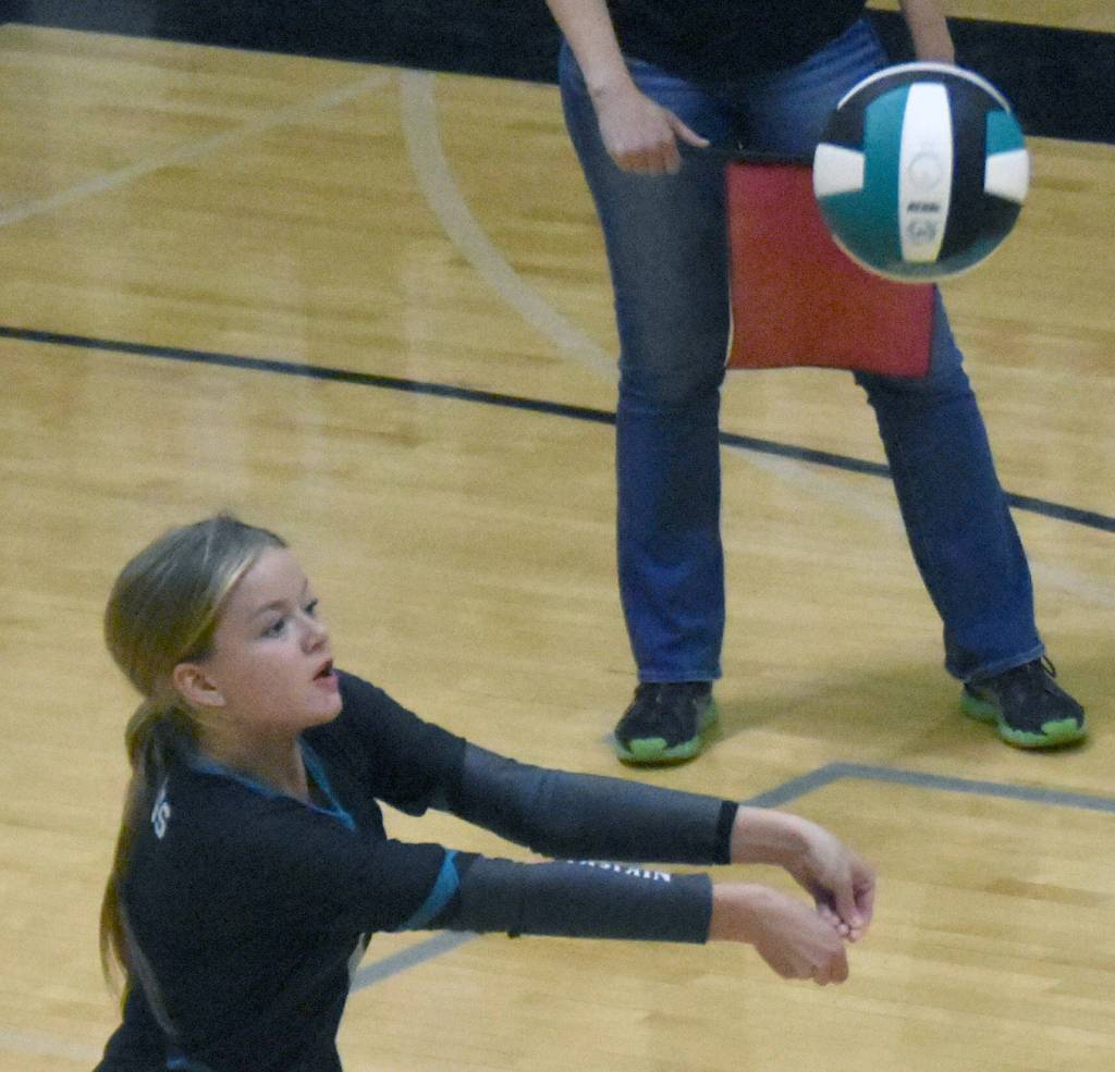 Nikiskis Abby White digs up a ball Saturday, Sept. 7, 2024, at the 17th Annual Shayna Pritchard Memorial Volleyball Tournament at Nikiski Middle-High School in Nikiski, Alaska. (Photo by Jeff Helminiak/Peninsula Clarion)